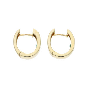 Creolen 585 Gold Smaragd 0,04 ct Brillanten getragen...